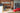 AS-IS Red-Ish Wood Wall Paneling